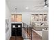 Open floorplan featuring hardwood floors, modern decor with staircase and natural light at 2541 Peyton Woods Sw Trl, Atlanta, GA 30311