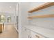 Walk-in pantry boasts custom shelving and a convenient countertop prep area at 5424 Gallagher Ct, Powder Springs, GA 30127