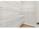 Spacious walk-in pantry features ventilated wire shelving for optimal organization at 5424 Gallagher Ct, Powder Springs, GA 30127