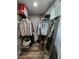 Functional walk-in closet with shelving, hanging racks, and plenty of room for storage, with a stylish mirror at 6567 Post Rd, Douglasville, GA 30135