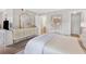 Comfortable main bedroom with a large mirror and glimpses into the bathroom at 1150 Collier Nw Rd # D20, Atlanta, GA 30318