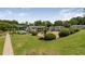 Apartment complex features a well-maintained sand volleyball court with net at 1150 Collier Nw Rd # D20, Atlanta, GA 30318