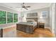 Bedroom with natural light, hardwood floors, and neutral tones create a relaxing atmosphere at 2434 Soft Maple St, Atlanta, GA 30360