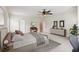 Large bedroom with neutral tones, and plush carpet. A great space for an office or sitting area at 2434 Soft Maple St, Atlanta, GA 30360