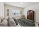 Bedroom with neutral colors, plush carpet, and a walk in closet, furnished at 2434 Soft Maple St, Atlanta, GA 30360