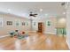 Spacious bonus room featuring hardwood floors, ceiling fan, and ample windows at 2434 Soft Maple St, Atlanta, GA 30360