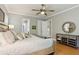 Comfortable main bedroom with wood floors, neutral colors, and ample closet space at 2434 Soft Maple St, Atlanta, GA 30360