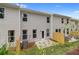 Townhome backyard featuring a small patio and privacy fence; nice outdoor space at 320 Navigator Ln, Mcdonough, GA 30253
