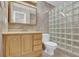 Bathroom featuring marble tiling and unique glass block shower at 4047 Watkins Glen Dr, Woodstock, GA 30189