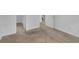 Neutral carpeted bedroom featuring open doorway and visible bathroom at 4047 Watkins Glen Dr, Woodstock, GA 30189