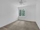 Bright bedroom features a window that lets in an abundance of natural light at 4047 Watkins Glen Dr, Woodstock, GA 30189