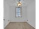Modest bedroom featuring carpet, ceiling fan, and a window at 4047 Watkins Glen Dr, Woodstock, GA 30189