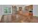 Spacious kitchen featuring a large island, stainless steel appliances, and hardwood floors at 4047 Watkins Glen Dr, Woodstock, GA 30189