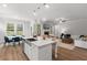 Open concept kitchen and living area with breakfast nook, and natural light at 4060 Andover Cir, Mcdonough, GA 30252