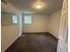A bedroom featuring neutral walls, a window, and carpet at 5460 Huron Dr, Morrow, GA 30260