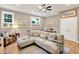 Inviting living room provides a relaxing atmosphere with ample seating, natural light, and stylish decor at 701 Dunwoody Chace, Atlanta, GA 30328