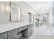 Spacious main bathroom features double vanities, a glass shower, and modern lighting at 1445 Hillside Dr, Grayson, GA 30017