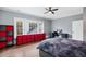 Spacious bedroom with hardwood floors, large windows, and ample storage at 1445 Hillside Dr, Grayson, GA 30017