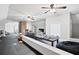 Large bonus room with high ceilings, ceiling fans, and large tables and is perfect for entertaining at 1445 Hillside Dr, Grayson, GA 30017