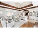 Spacious living room boasts hardwood floors, arched doorway, and lots of natural light at 1445 Hillside Dr, Grayson, GA 30017