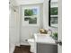 Contemporary bathroom with a glass-enclosed shower, modern vanity, and updated fixtures at 2284 Briarwood Cir, Conyers, GA 30094
