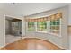 Bright breakfast nook with large windows and laminate flooring at 3770 Clubland Trl, Marietta, GA 30068