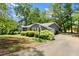 Image of a well-maintained home with charming details and a lush, green lawn at 3770 Clubland Trl, Marietta, GA 30068