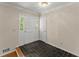 Bright foyer with tile flooring, and a glimpse of natural light through sidelight windows at 3770 Clubland Trl, Marietta, GA 30068