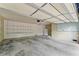 Spacious garage with exposed ceiling features, open shelving, and room for storage or workspace at 3770 Clubland Trl, Marietta, GA 30068