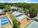 Aerial view of the community pool with lounge chairs and manicured landscaping at 3770 Clubland Trl, Marietta, GA 30068