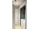 Functional laundry room with a white washer and dryer, built in shelving, and easy access from inside the home at 320 Orleans Blvd, Mcdonough, GA 30253