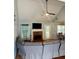 Inviting living room with vaulted ceilings, a brick fireplace, and ample natural light from large windows at 320 Orleans Blvd, Mcdonough, GA 30253