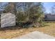 Backyard featuring a storage shed and patio at 4912 Bayside Ct, Stone Mountain, GA 30088