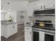 Updated kitchen with granite countertops, modern appliances, and plenty of counter space at 4912 Bayside Ct, Stone Mountain, GA 30088