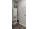 A utility room featuring a new water heater and open shelving for storage at 4912 Bayside Ct, Stone Mountain, GA 30088