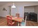 Cozy dining area features hardwood floors, an adjacent laundry area, and seating for four at 510 Pineland Sw Rd, Mableton, GA 30126