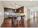 Gourmet kitchen with stainless steel appliances, custom cabinetry, and breakfast bar seating at 2700 Paces Ferry Se Rd # 202, Atlanta, GA 30339