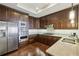 Gourmet kitchen boasts stainless steel appliances, granite countertops, and ample cabinet space at 2700 Paces Ferry Se Rd # 202, Atlanta, GA 30339