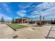 Entertaining outdoor kitchen features a bbq island, bocce court and alfresco dining area at 2700 Paces Ferry Se Rd # 202, Atlanta, GA 30339
