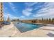 An inviting pool area showcasing comfortable loungers and a clear blue pool, perfect for relaxation and recreation at 2700 Paces Ferry Se Rd # 202, Atlanta, GA 30339
