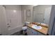 Bathroom featuring a bathtub, modern flooring, and vanity at 3142 Imperial Sw Cir, Atlanta, GA 30311