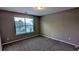 Cozy bedroom with natural light, plush carpet, and a calming ambiance at 3142 Imperial Sw Cir, Atlanta, GA 30311