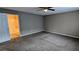Spacious bedroom with neutral walls, ceiling fan, and plush carpeting at 3142 Imperial Sw Cir, Atlanta, GA 30311