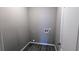 Dedicated laundry room with modern flooring, clean lines and washer/dryer hookups at 3142 Imperial Sw Cir, Atlanta, GA 30311