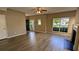 Spacious open-concept living area with hard surface floors and abundant natural light at 3142 Imperial Sw Cir, Atlanta, GA 30311