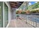 Enjoy fresh air on this balcony featuring a white railing and a storage closet at the far end at 3142 Reeves Se St, Smyrna, GA 30080