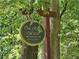 Entrance sign for Oak Ridge Manor Private Residences surrounded by green foliage at 3142 Reeves Se St, Smyrna, GA 30080