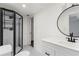 Bathroom features a modern walk-in shower with black hardware, a toilet and bright white walls at 413 Sassafras Rd, Roswell, GA 30076