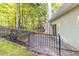 Well-maintained backyard with patio and privacy fence at 5335 Lexington View Pl, Sugar Hill, GA 30518
