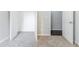 Carpeted bedroom featuring closet with shelving at 5335 Lexington View Pl, Sugar Hill, GA 30518